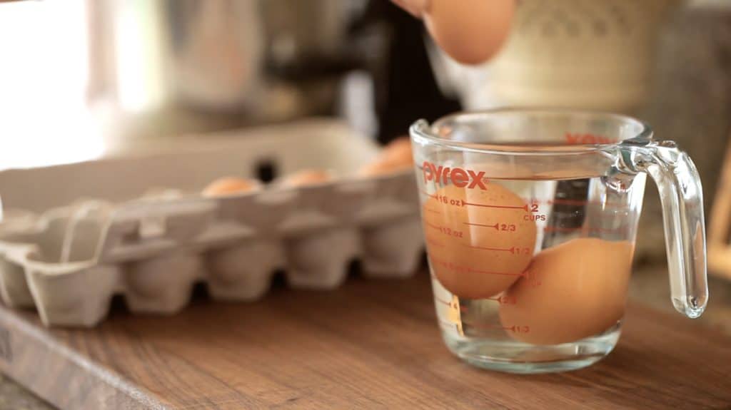 Eggs soaking in warm water to come up to room temperature