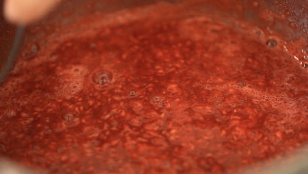 pureed raspberry sauce in a sauce pot 