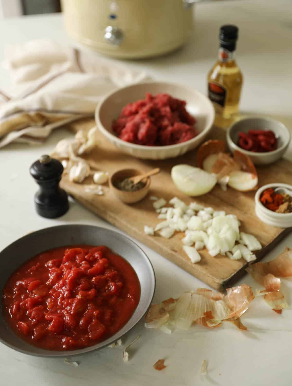 Ingredients for slow cooker tacos laid out on a counter.