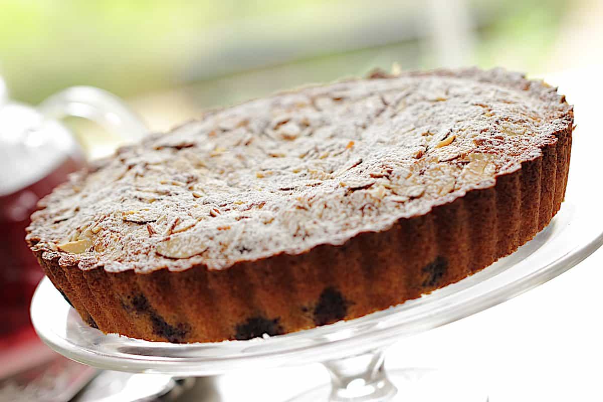 Blueberry Almond Tea cake on a Clear Cake stand 