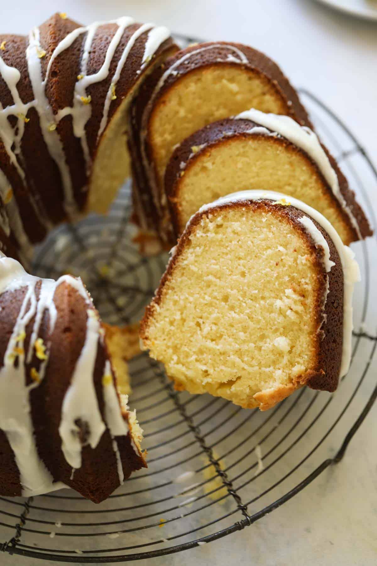 close up of a lemon pound cake sliced showing its textured