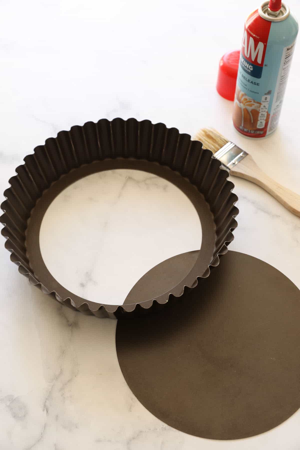 a deep dish cake pan with removable bottom