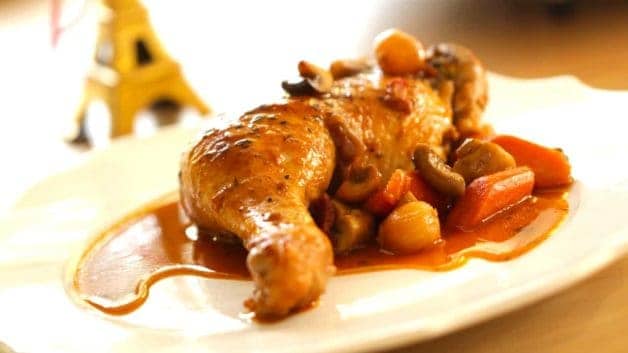 Coq au vin recipe on plate ready to be served