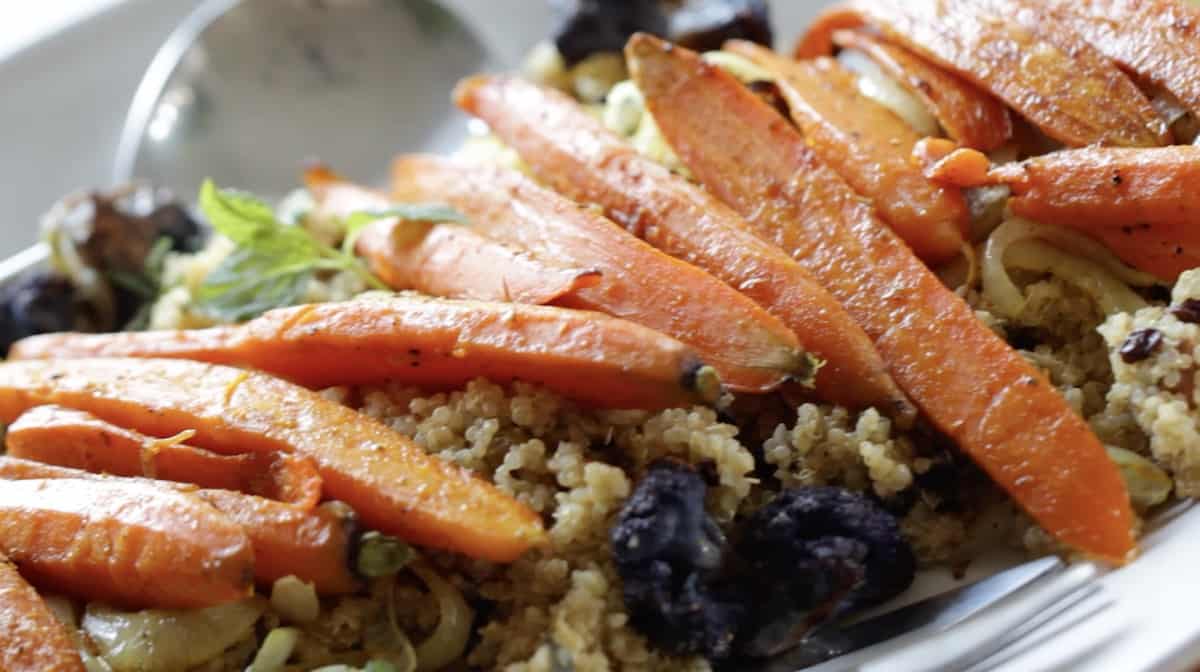 Curried carrots on a bed on Quinoa