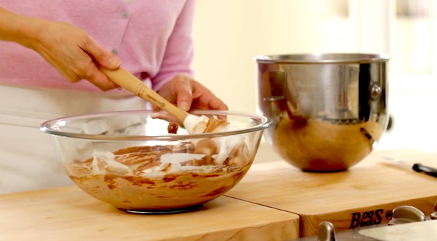 Folding in egg whites to a cocolate souffle base mixture