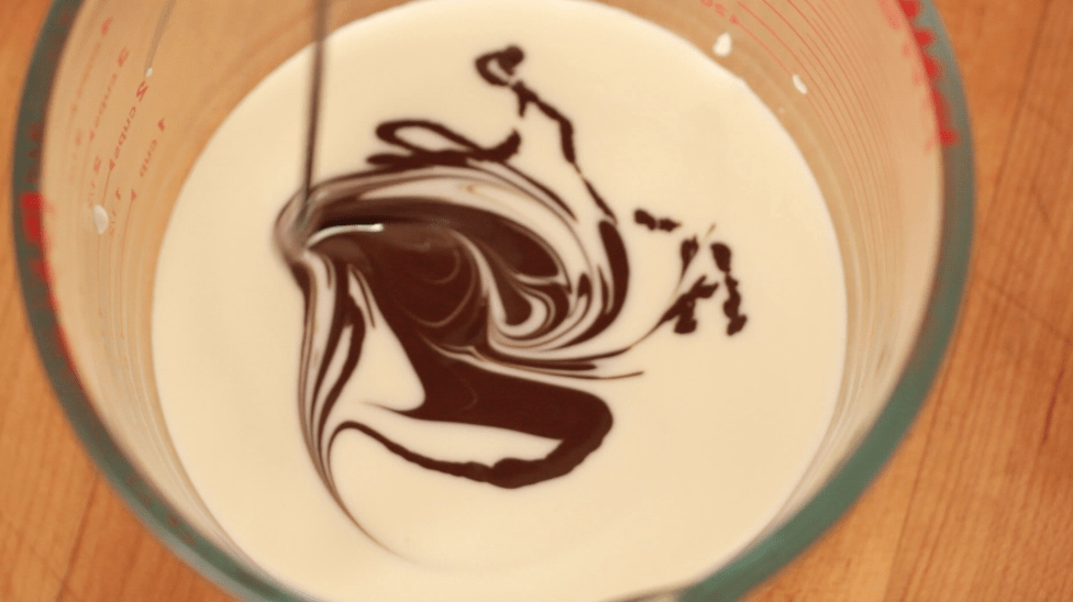 swirling dark chocolate into white chocolate