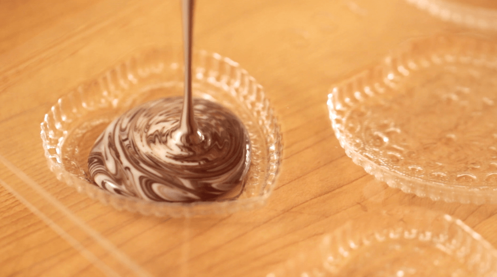 Pouring Marbled Chocolate into chocolate mold