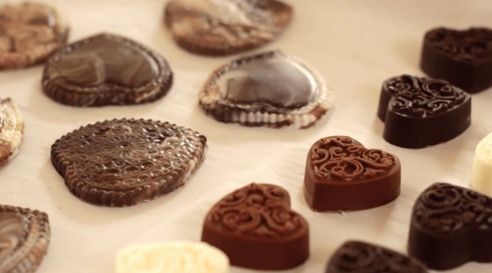 Homemade chocolates on parchment paper