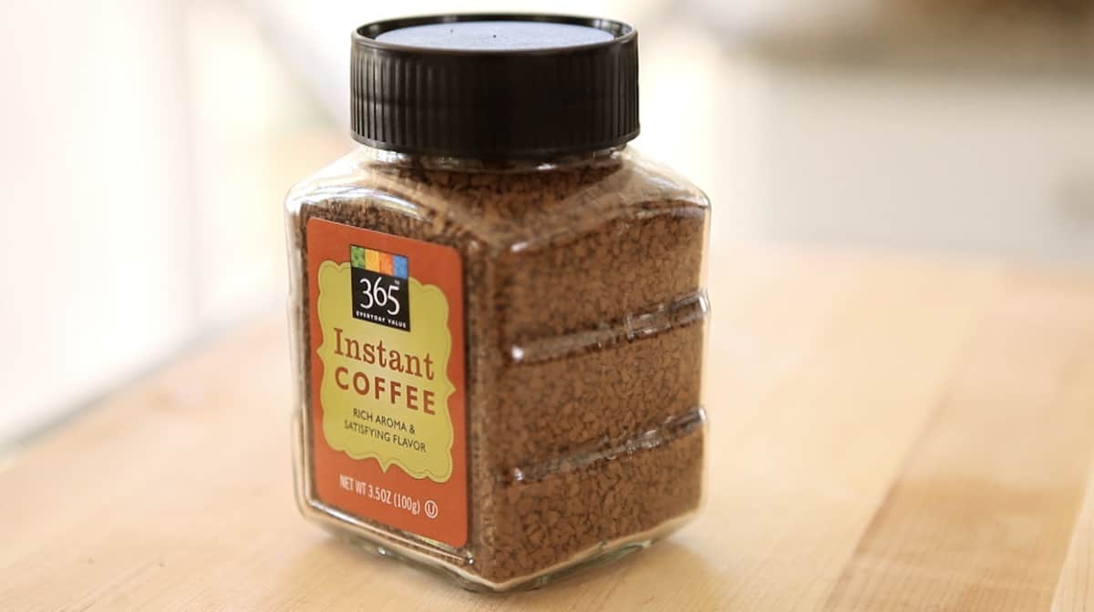 a jar of instant coffee on a counter top