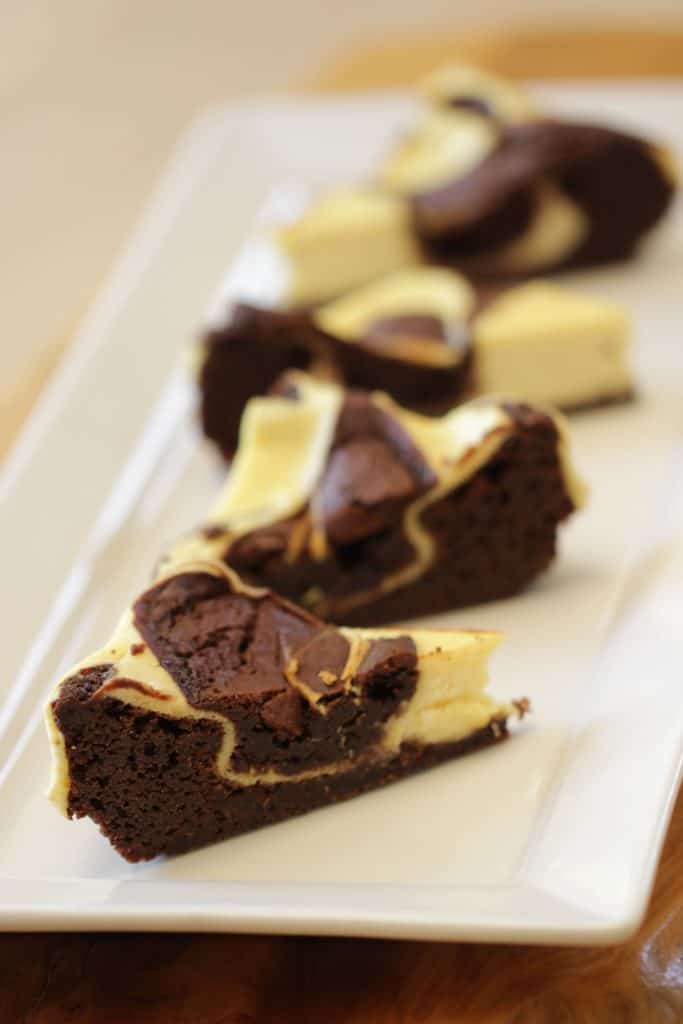 Cream Cheese Brownie Recipe slices served on a white plate