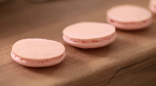 Pink French Macaron shells on their backs