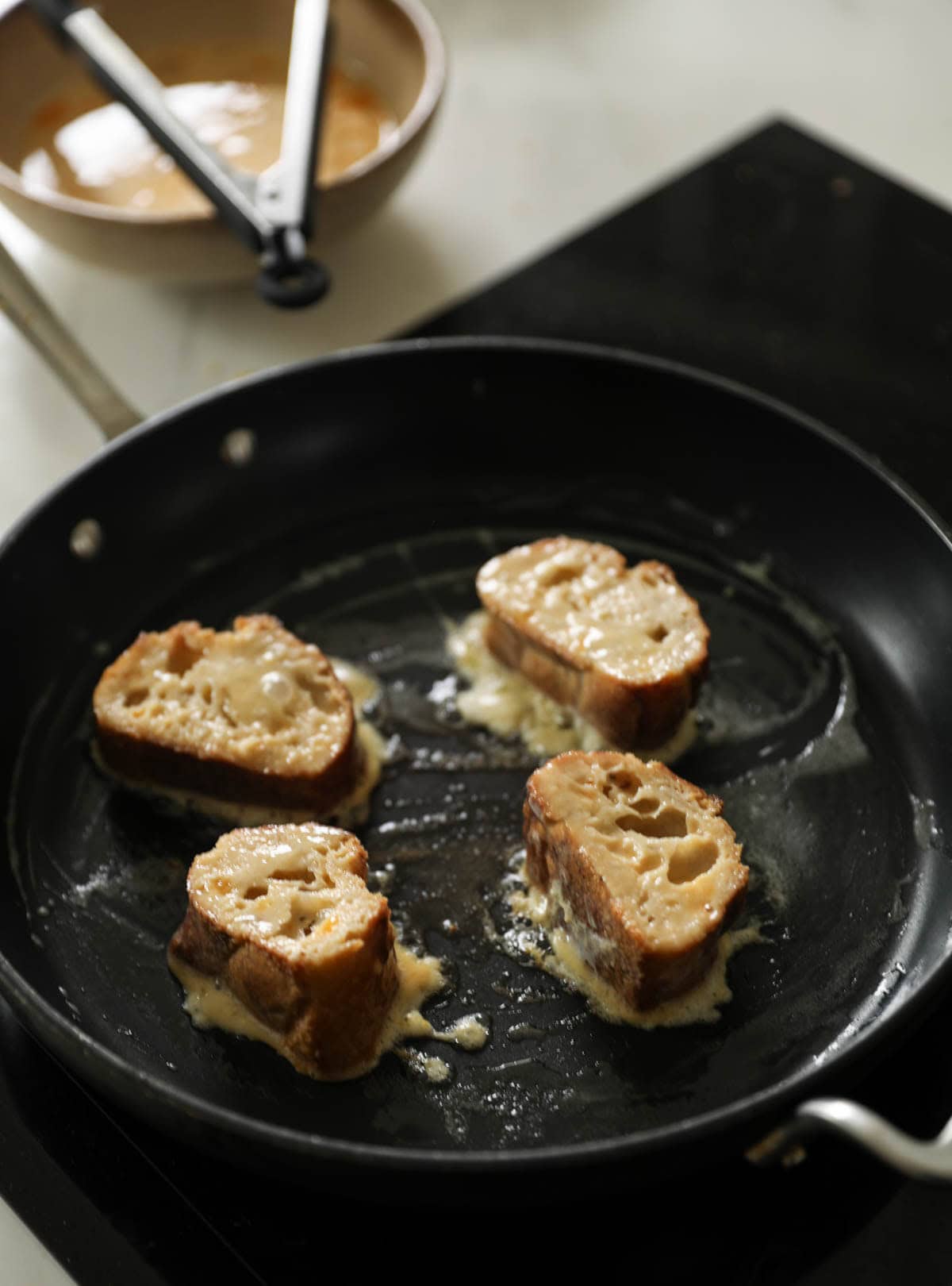 French toast cooking in a skillet
