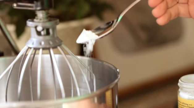 Adding Cream of Tartar to an electric mixing bowl