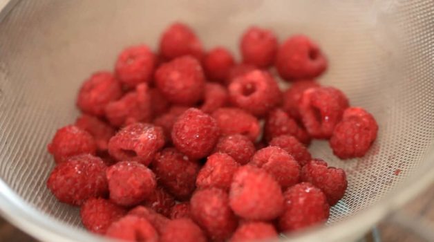Freshly Washed Raspberries in a sieve