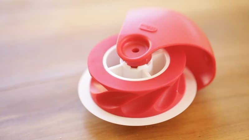 red pie crust crimping gadget close up