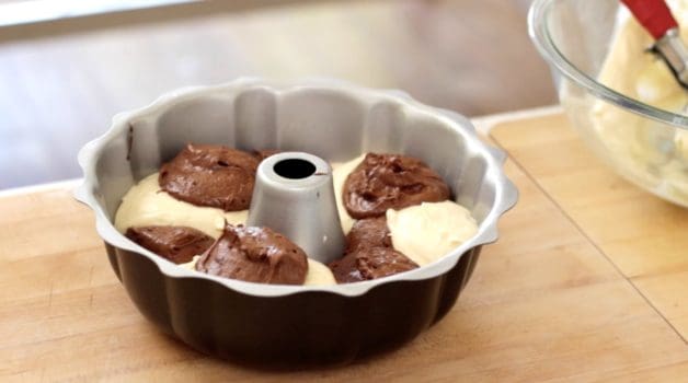 Chocolate and Vanilla Batter Balls in Bundt Pan for a Chocolate Vanilla Marble Cake 