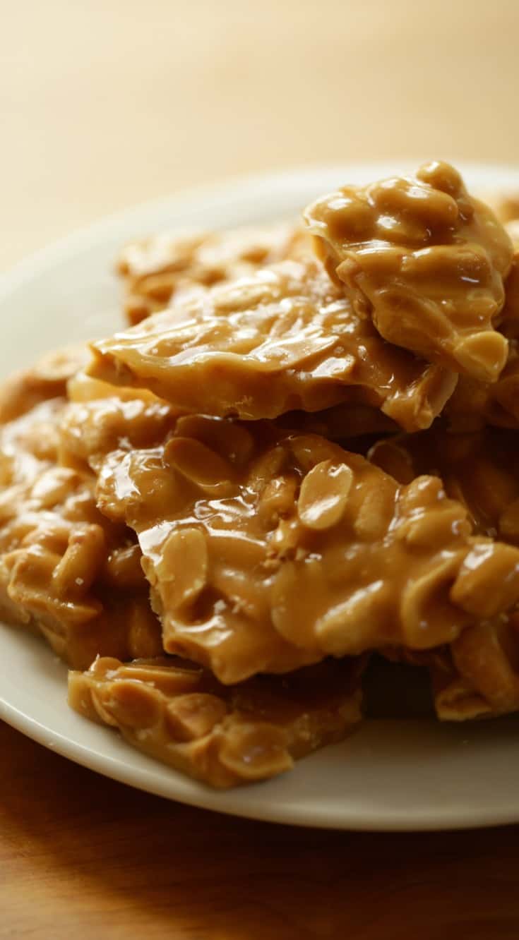 Peanut Brittle Shards on a plate vertical image