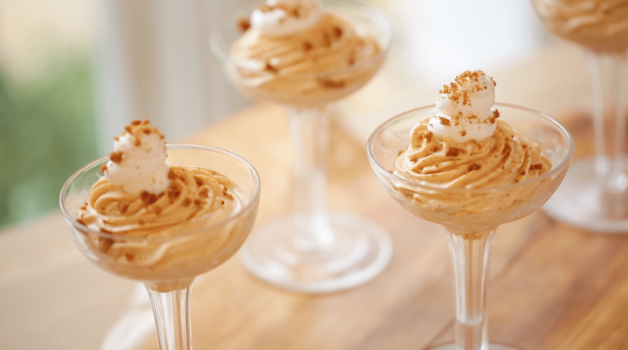 No-Bake Pumpkin Mousse served in tall glasses on a wood board