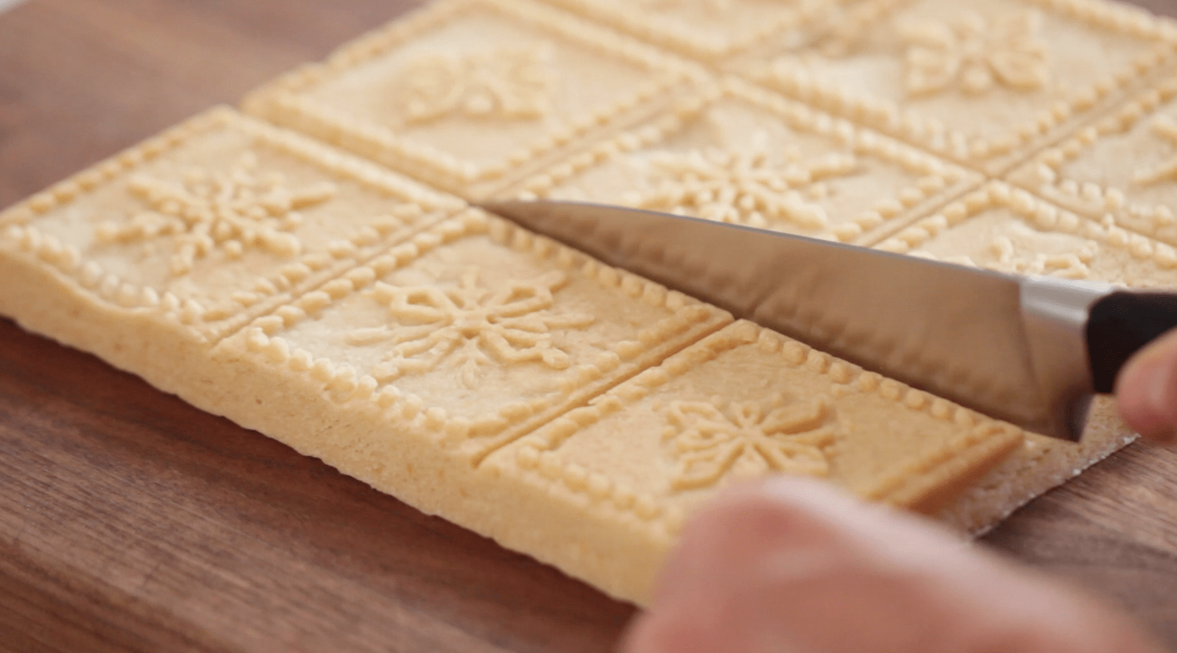 Cutting a Holiday Shortbread Recipe into squares 