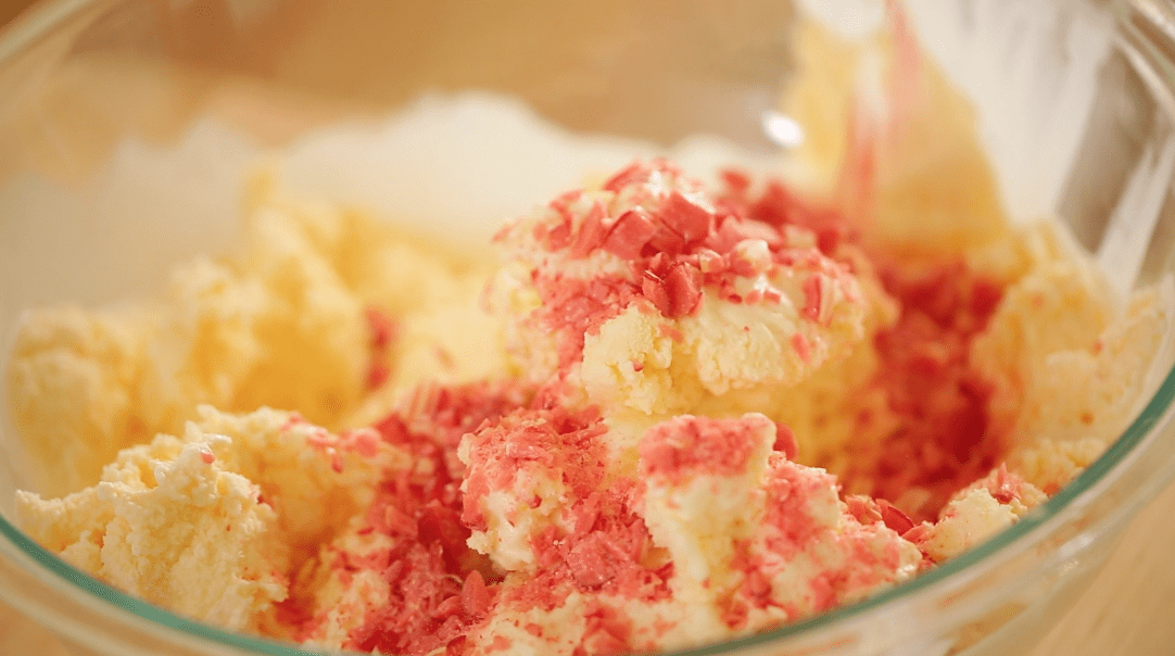 A bowl of vanilla ice cream with Crushed Candy Canes on top