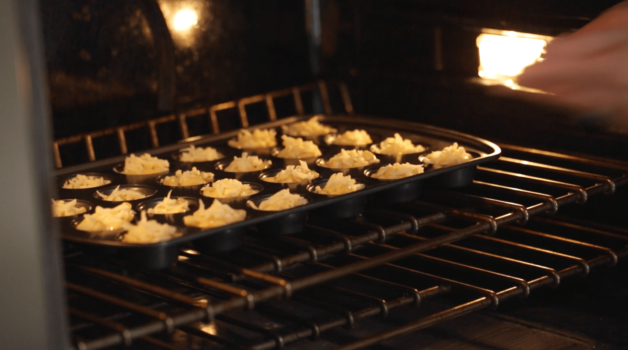 Bacon Mac & Cheese Bites going into the oven