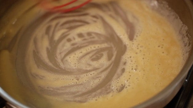 whisking butter and flour together in a skillet