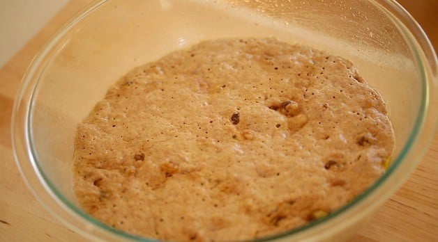 Bread dough risen 12 hours in a bowl