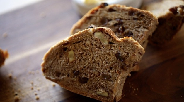 slices of freshly baked cinnamon raisin bread on a cutting board