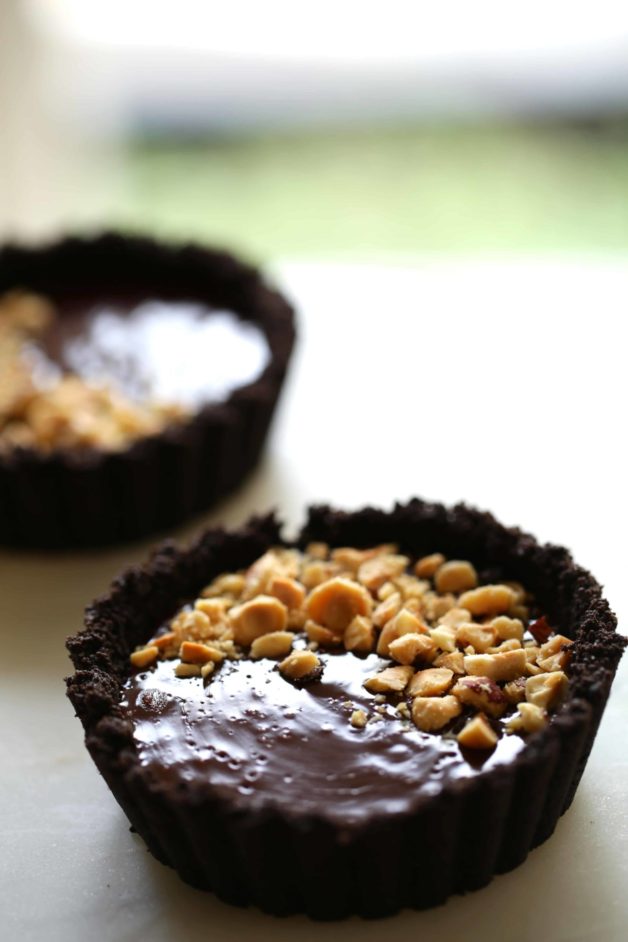 Mini Chocolate hazelnut tarts on table