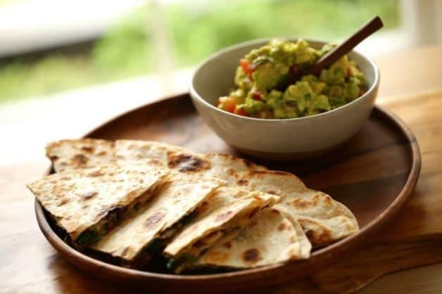 Veggie Quesadilla Recipe with Chunky Gaucomole served on a large wood bowl 