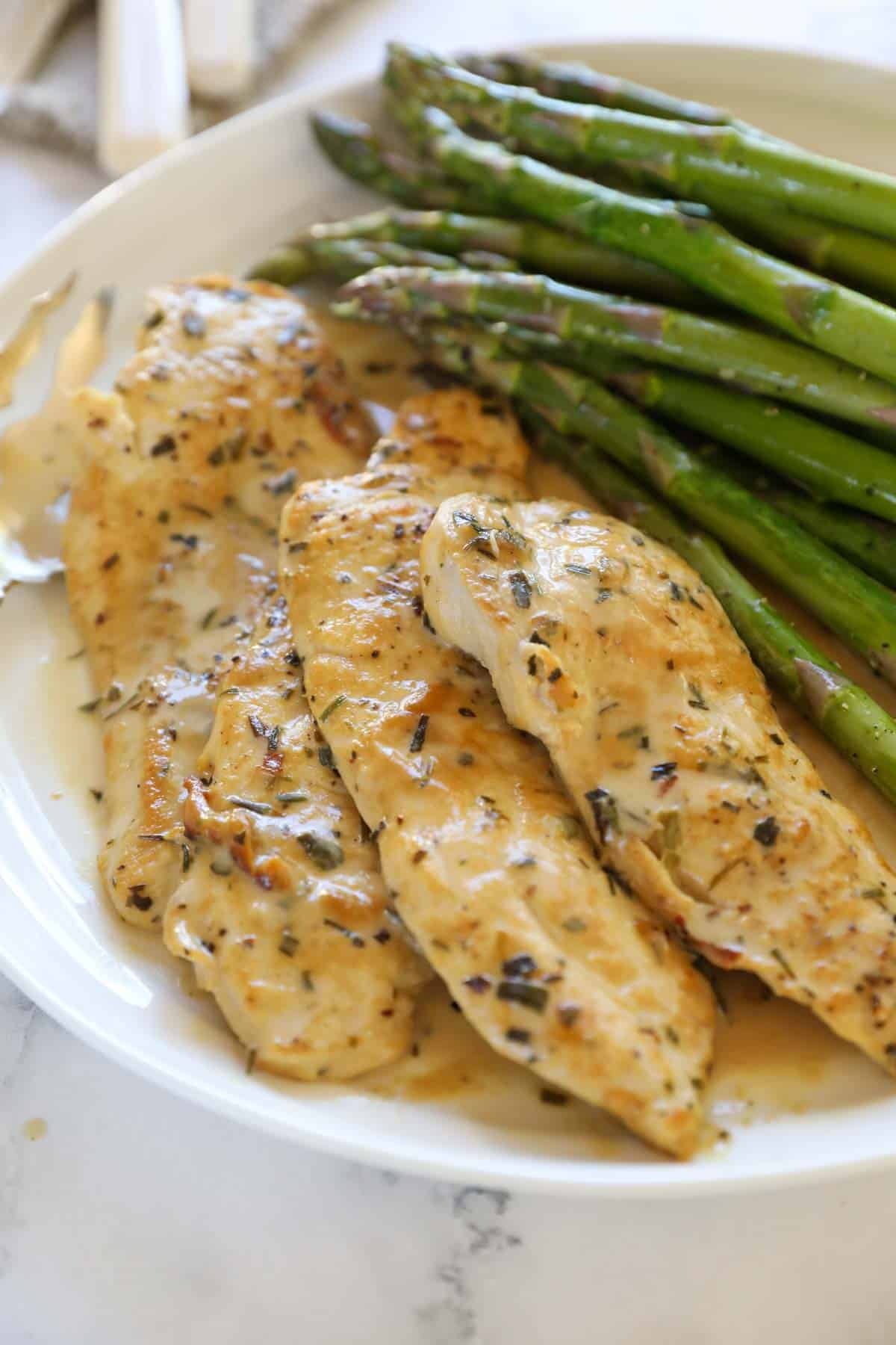 Chicken Breasts with Dijon Mustard Sauce Served with Sauteed Asparagus