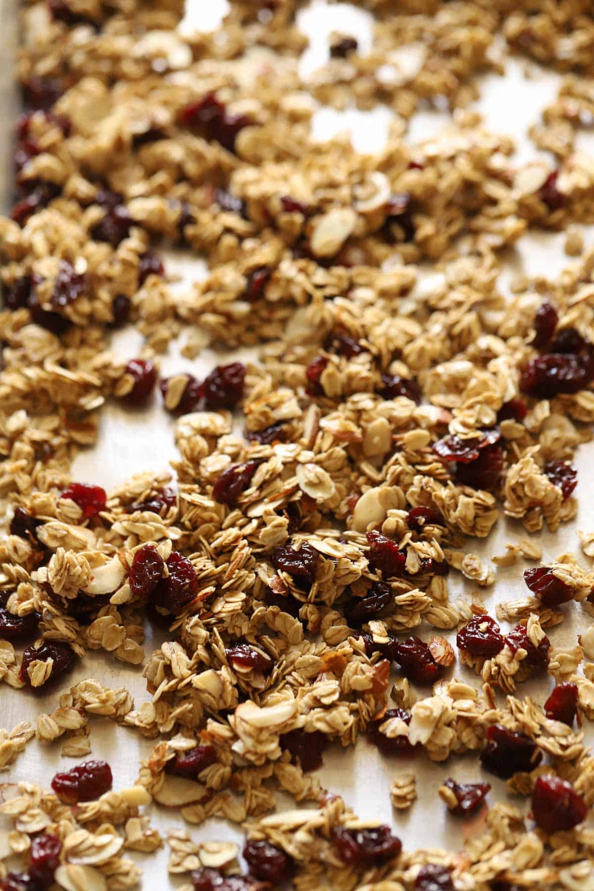 granola cooling on a sheet pan