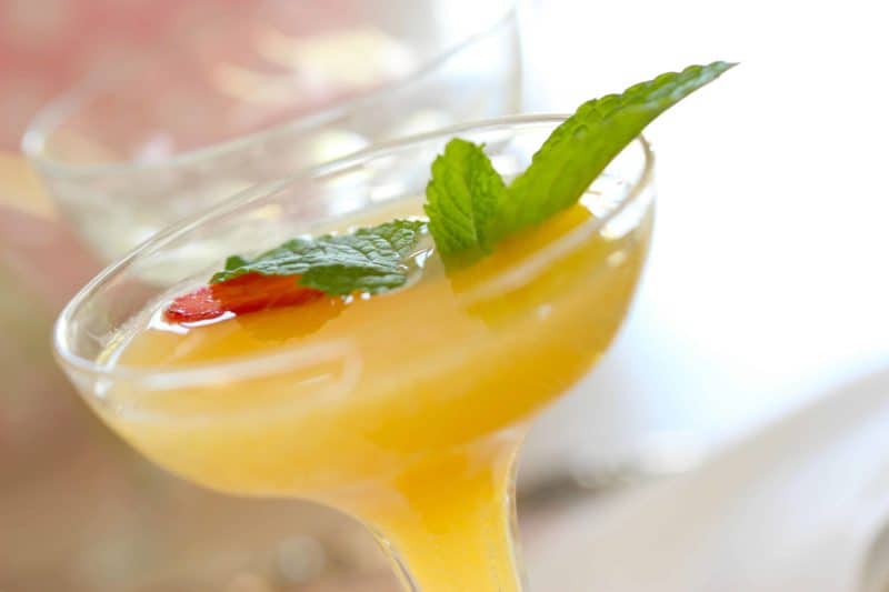 Champagne coup filled with a Baby Shower Punch Recipe