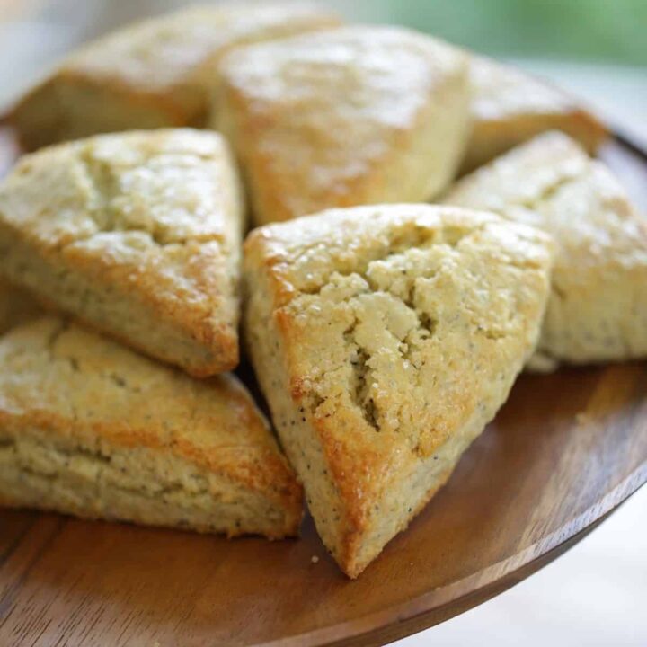 Lemon Poppy Seed Scones on a wooden platter