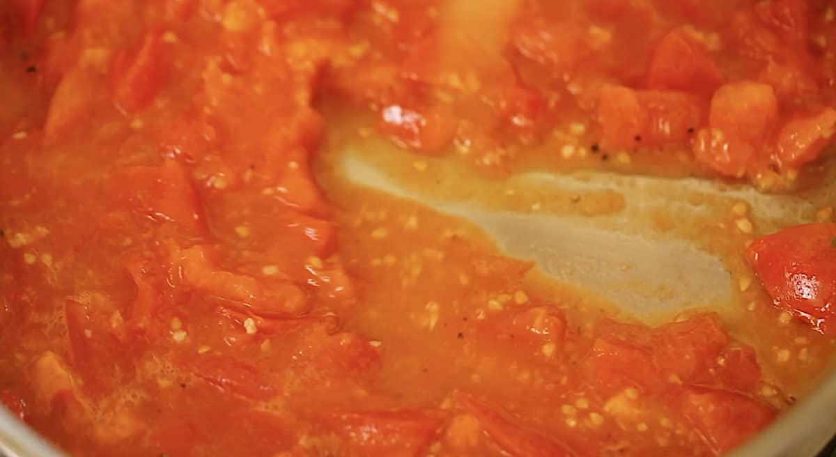 tomato sauce in a pan reducing