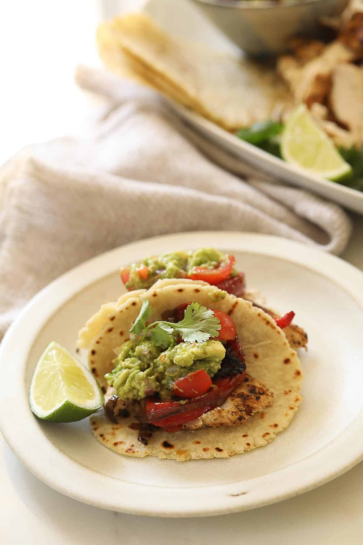 Chicken with guacamole fashioned into a taco.