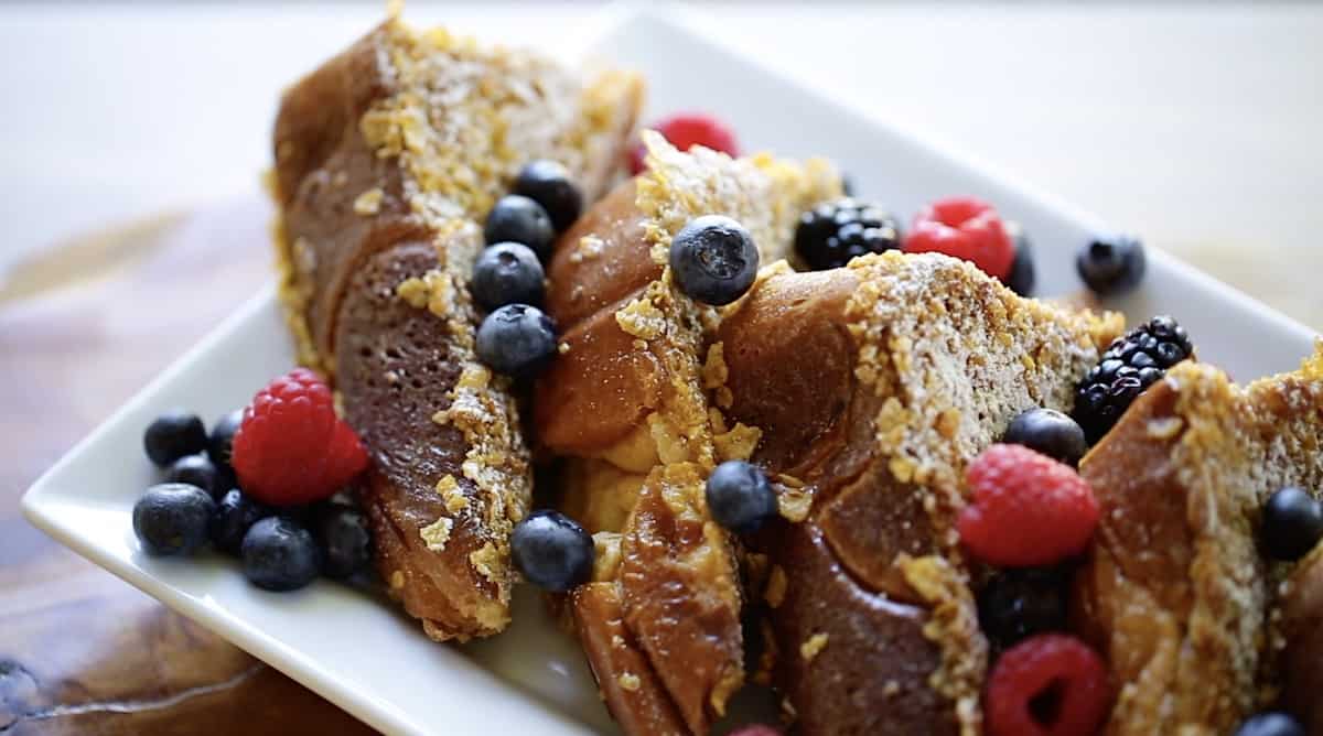 Berries on top of French toast slices