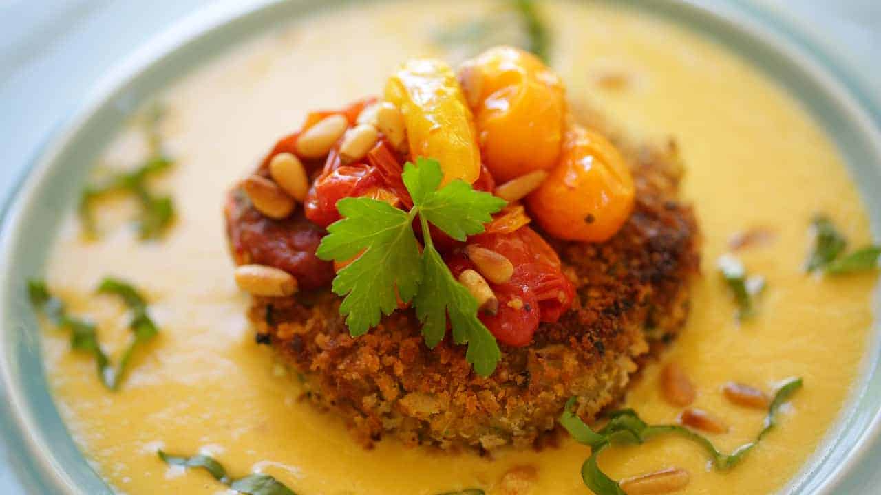 Vegan Quinoa Cakes with Corn Puree and Roasted Tomatoes