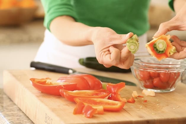 a bell pepper sliced showing the end and stem of the bel pepper