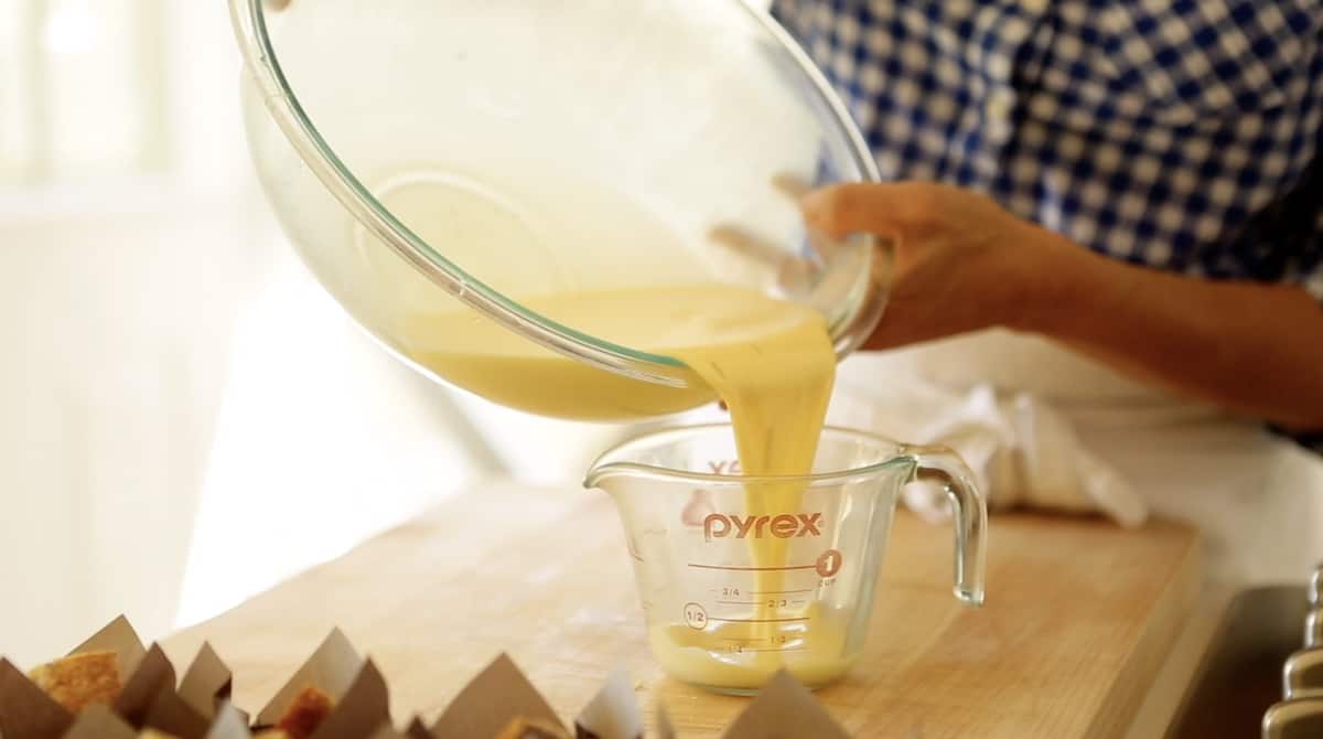 Pouring egg custard into a pyrex pitcher