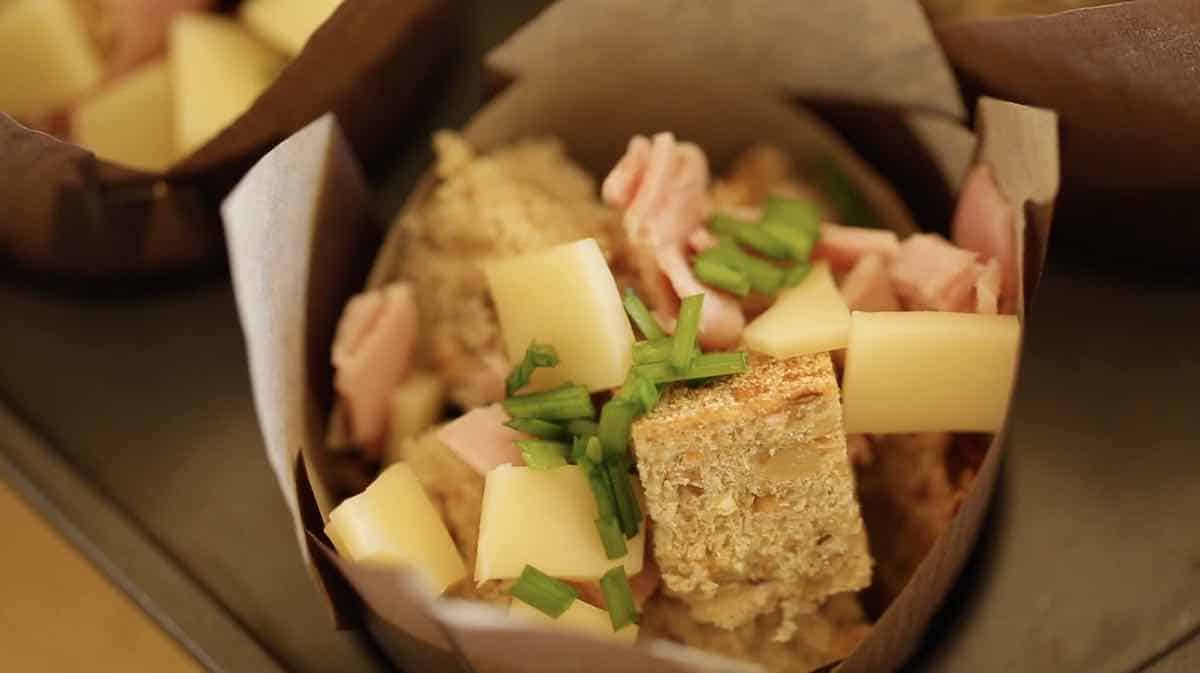 Tulip Muffin Papers filled with bread cubes, cheese, ham and chives