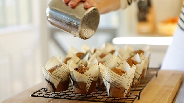 Baked Cappuccino muffins sprinkled with powdered sugar