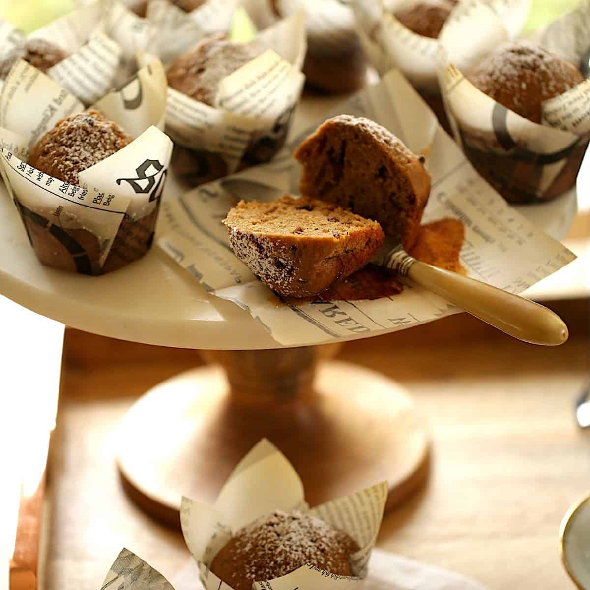 Cappuccino Muffins sliced and placed on a marble cake stand