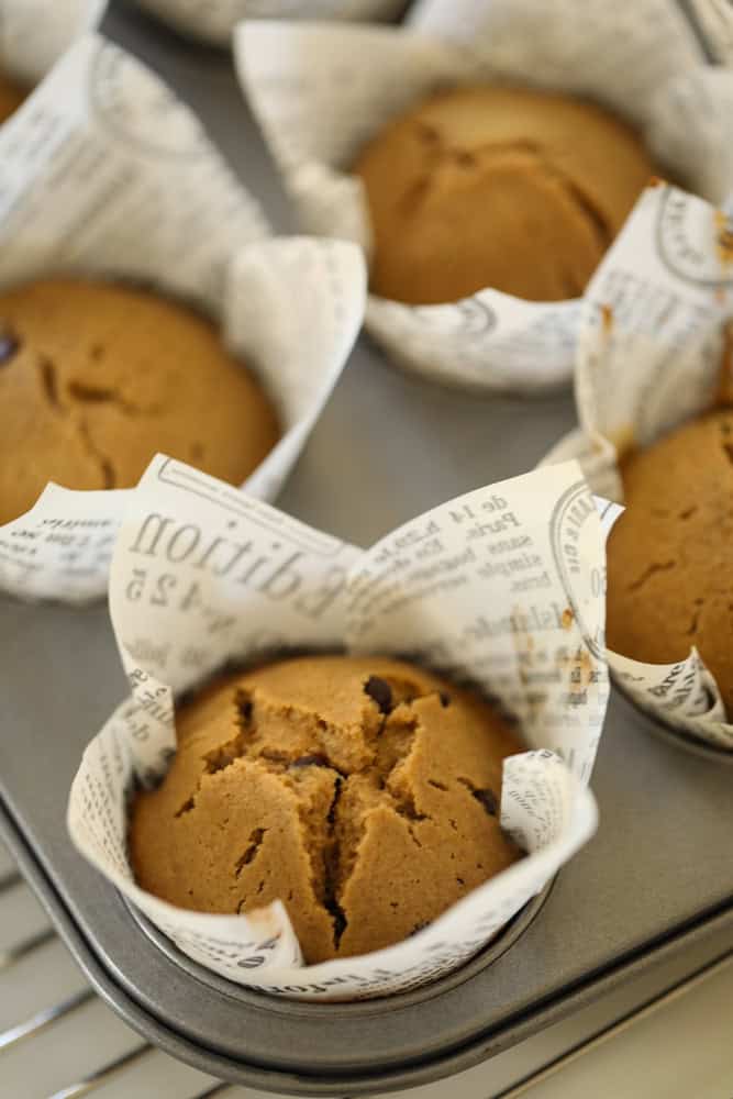 a baked muffin, cracked on top.