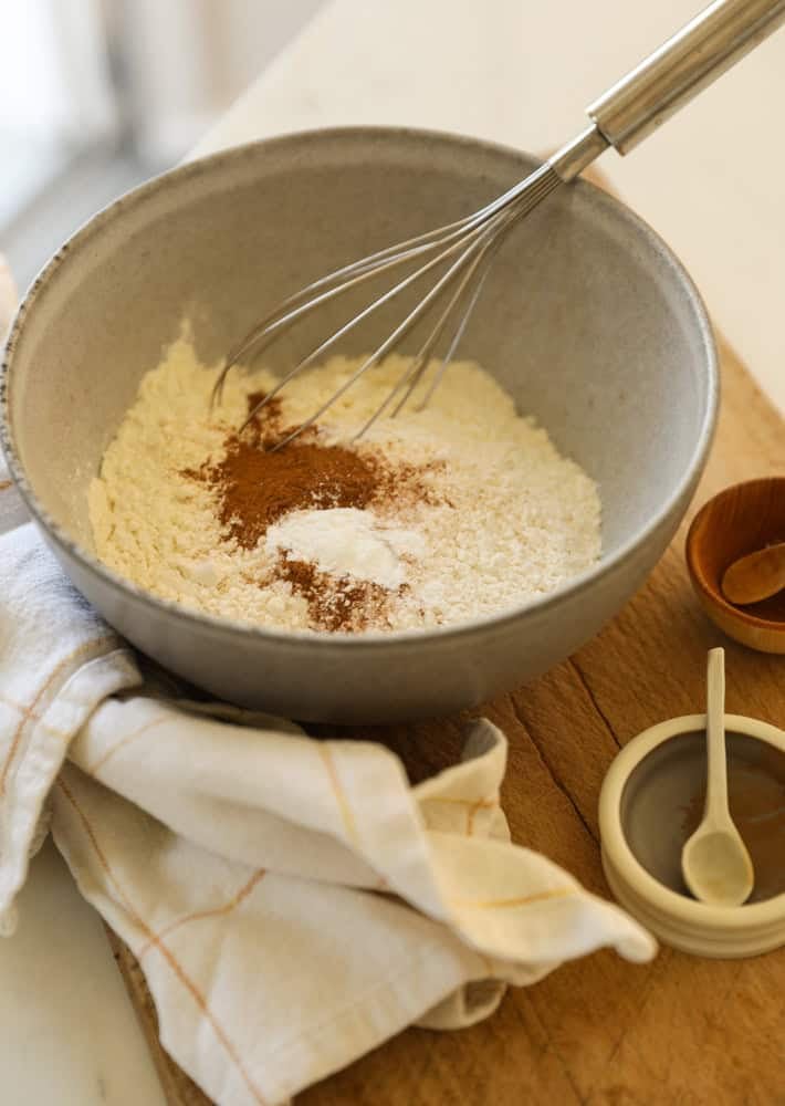 dry ingredients in a bowl with a whisk.