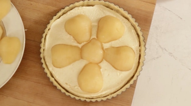 Overhead of unbaked pear tart