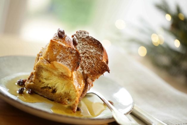 A slice of Gingerbread French Toast with Cinnamon Syrup on a plate