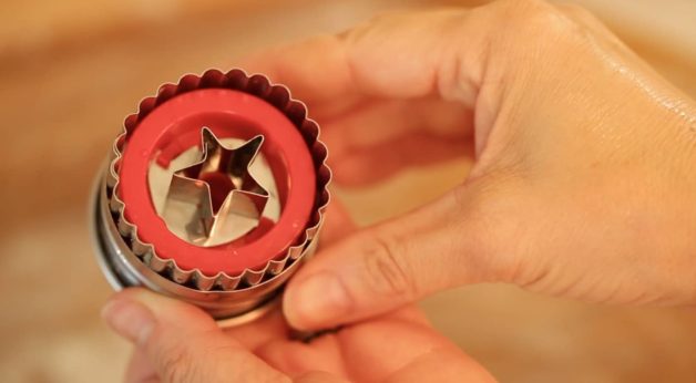 Showing interior of a Linzer Cookie Cutter with Star insert 