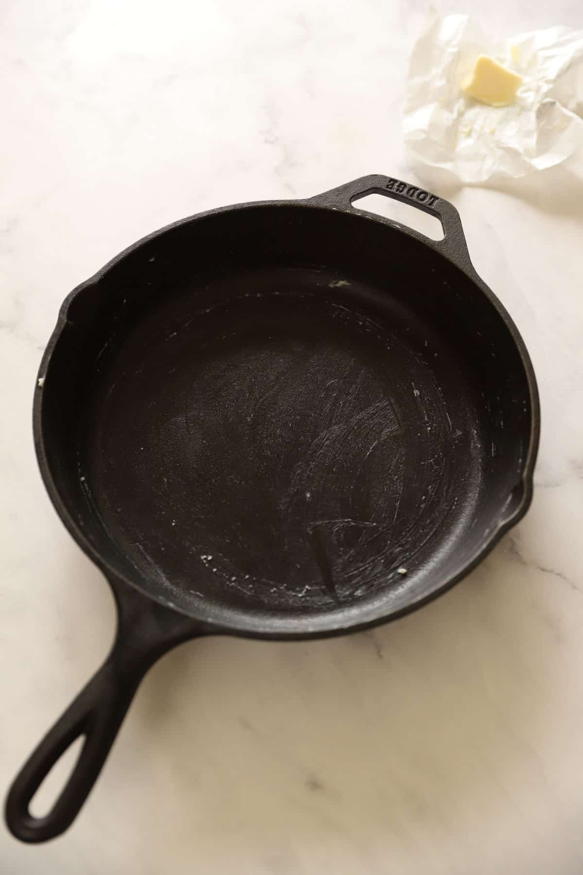 A cast-iron skillet buttered