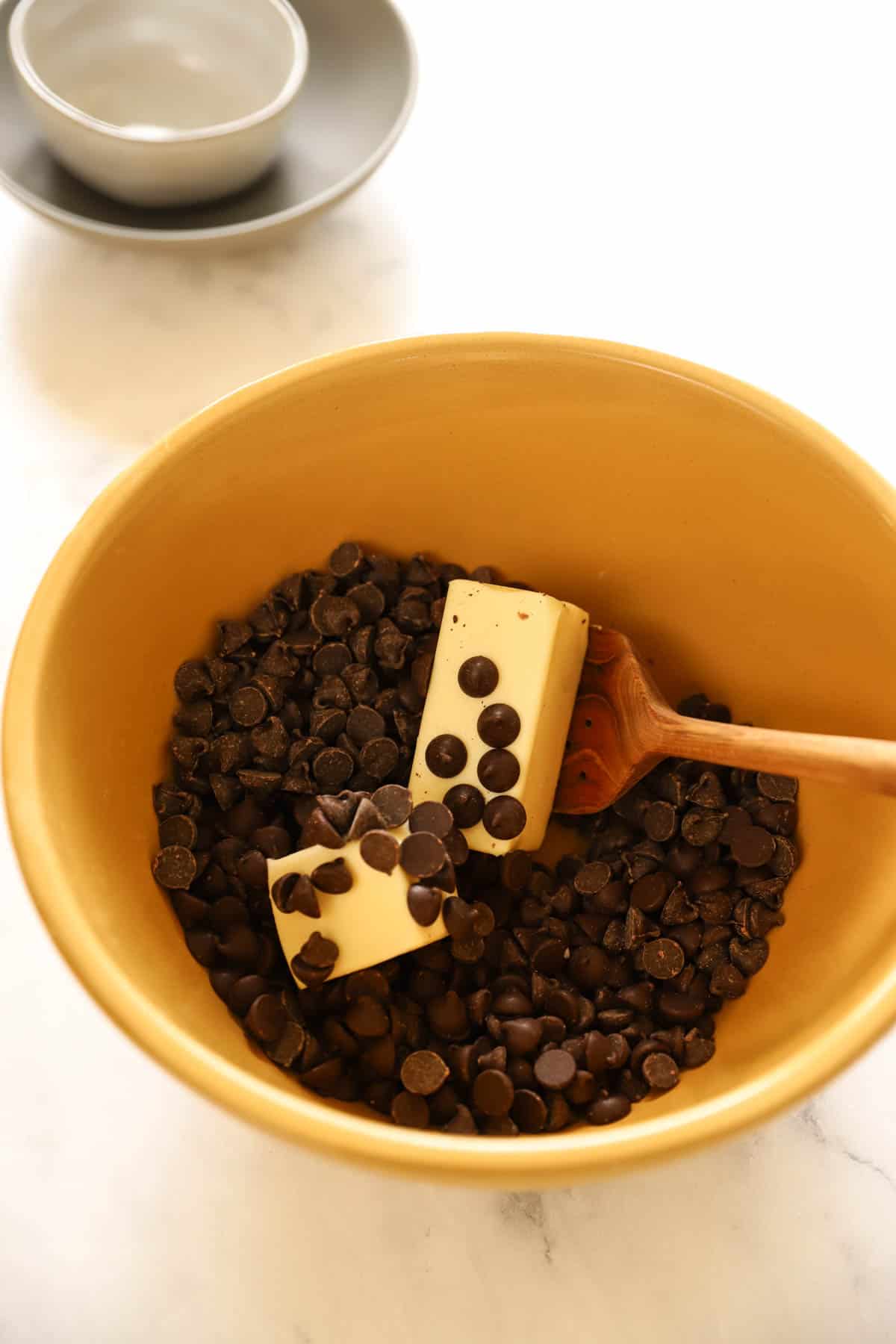 chocolate chips and butter in a bowl